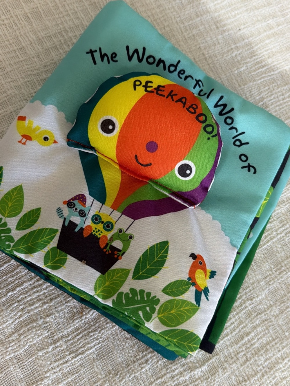 MELISSA & DOUG Peekaboo Colorful Hot Air Balloon Bird Toy Book - Green